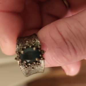 Nice ring needs polishing but silver with emarld.